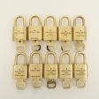 Louis Vuitton Set of 10 Lock & Key Cadena Key Lock Metal Gold For Sale